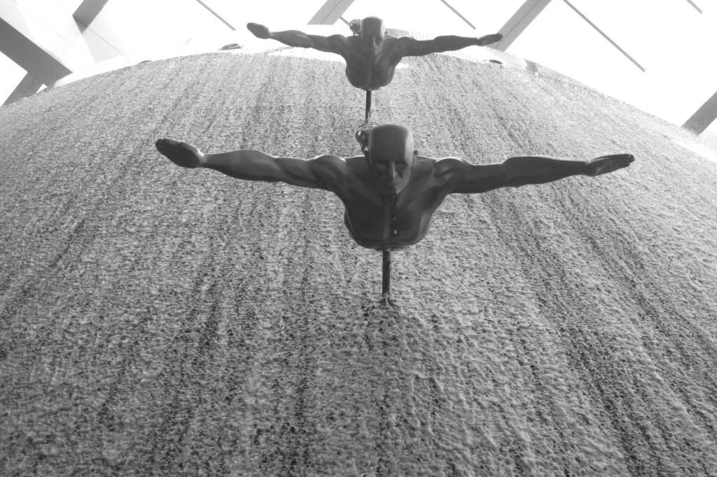 Statues on the waterfall at Dubai Mall