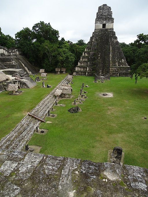View_over_Gran_Plaza_with_Templo_I_at_Rear_-_From_South_Acropolis_-_Tikal_Archaeological_Site_-_Peten_-_Guatemala_(15869434691)